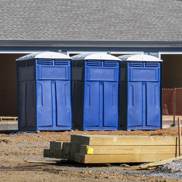 what is the cost difference between standard and deluxe portable toilet rentals in Brooklawn New Jersey